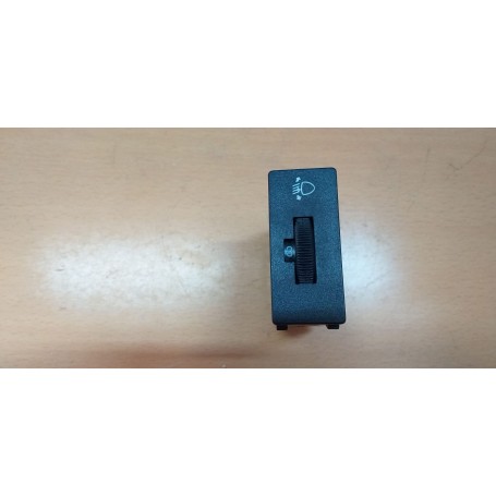 INTERRUTTORE COMANDO ASSETTO FARI 82392663 LANCIA DELTA - PRISMA CASSA 196/A