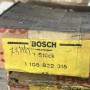 (A) Copricuscinetto Bosch NUOVO